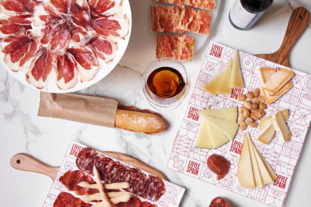 No visit to Mercado Little Spain in Manhattan's new Hudson Yards complex is complete without some jamón y queso (Serrano ham and Manchego cheese). Photo courtesy of Mercado Little Spain.