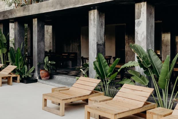 The pool deck and terraced restaurant at Casa Pueblo Tulum. Photo by Benjamin Holtrop.