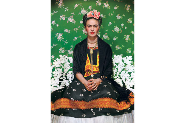 Frida on Bench, 1939. © Nickolas Muray Photo Archives