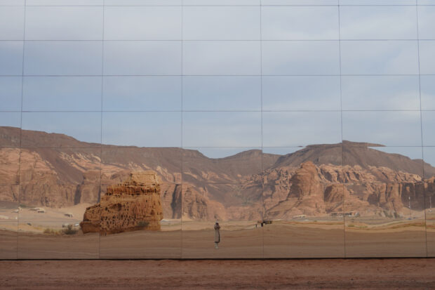 A solo traveler's best friend: The mirror selfie (seen here at the Maraya installation in Saudi Arabia). Photo by Elizabeth Harvey