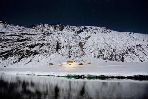 Exterior view over lake and snowy landscape of Minaret Station in New Zealand